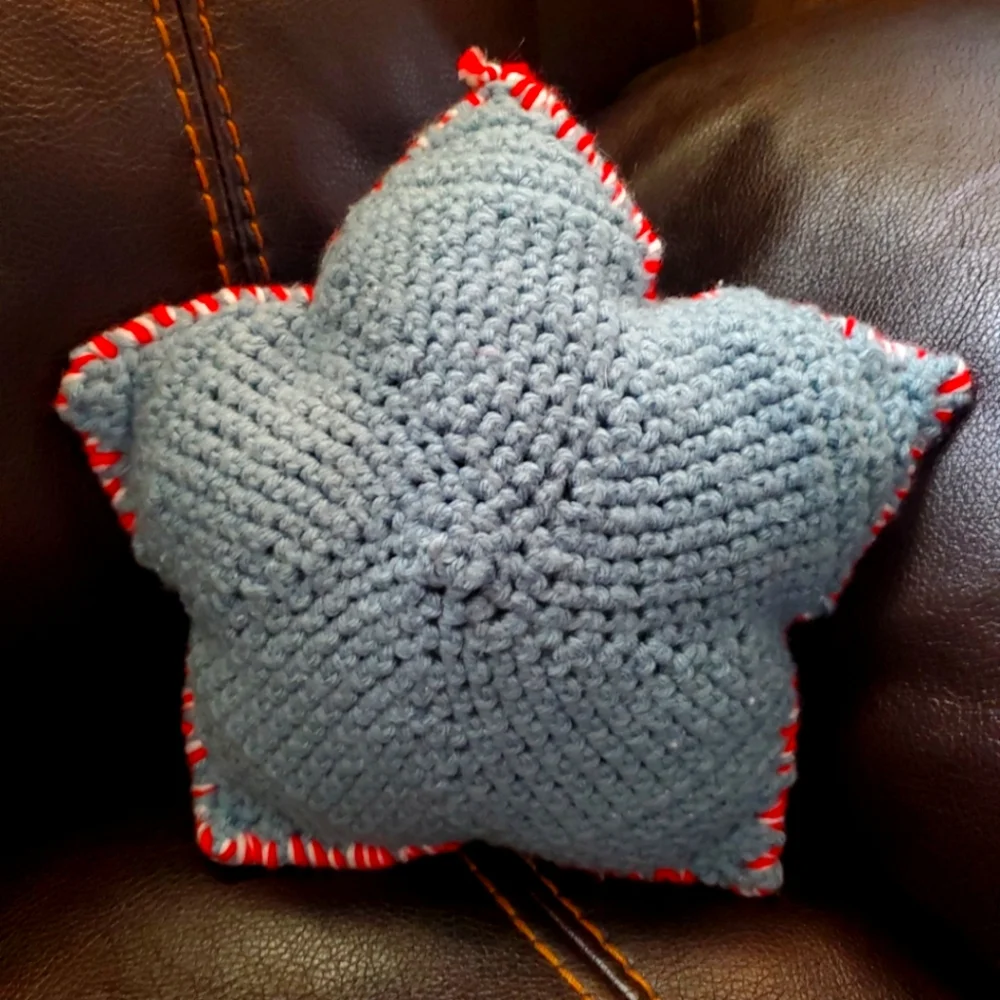 Crocheted star pillow or ornament